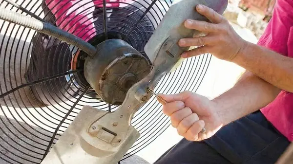 HVAC technician installing AC system